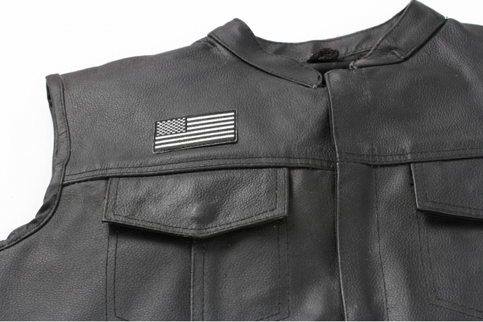 US Flag Patch Black and White 2.5 Inch - 2.5x1.4 inch. Embroidered Iron on Patch shown on leather vest