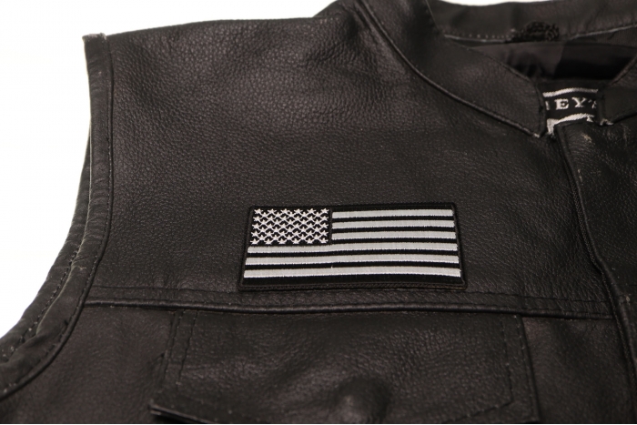 US Flag Patch Black and White 3.5 Inch - 3.5x1.9 inch. Embroidered Iron on Patch shown on leather vest