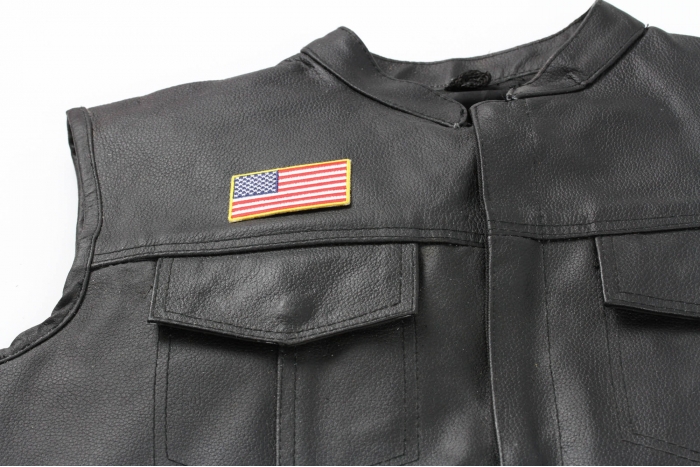 US Flag Patch Gold Border 2.5 Inch - 2.5x1.4 inch. Embroidered Iron on Patch shown on leather vest