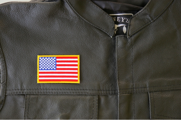 US Flag Patch Small Yellow Border 3 Inch - By Ivamis Trading - 3x2 inch shown on leather vest