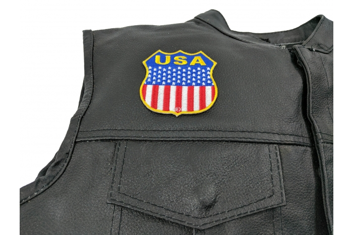 USA Shield Flag Patch - 2.75x2.75 inch. Embroidered Iron on Patch shown on leather vest