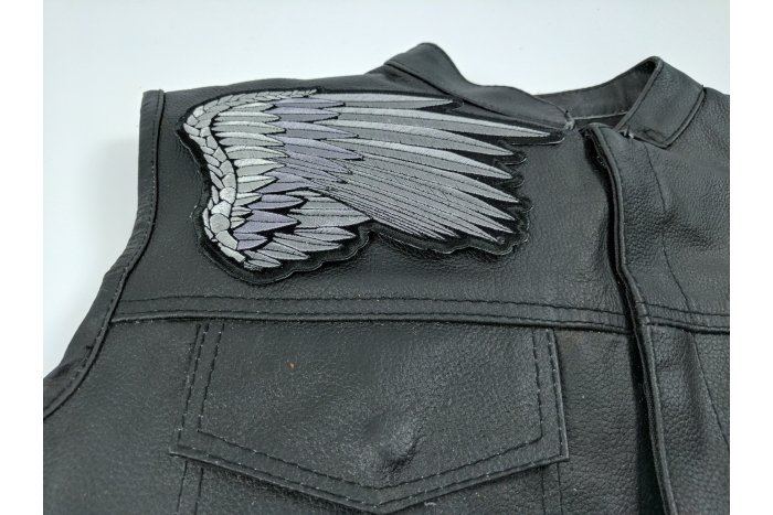  shown on leather vest