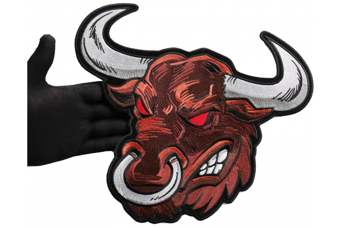 Angry Bull Patch, Large Animal Patches for Jackets shown on hand for size comparison