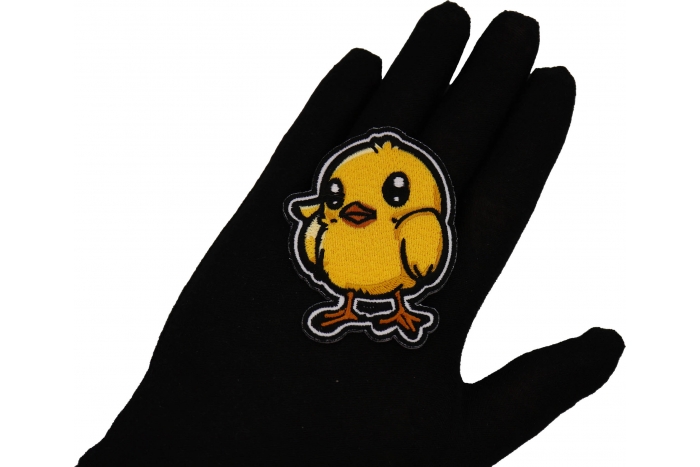 Baby Chick Patch shown on hand for size comparison