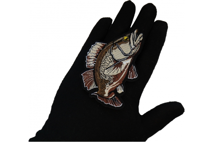 Bass Fish Patch shown on hand for size comparison
