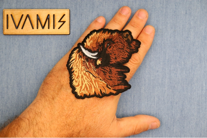 Buffalo Soldier Patch shown on hand for size comparison