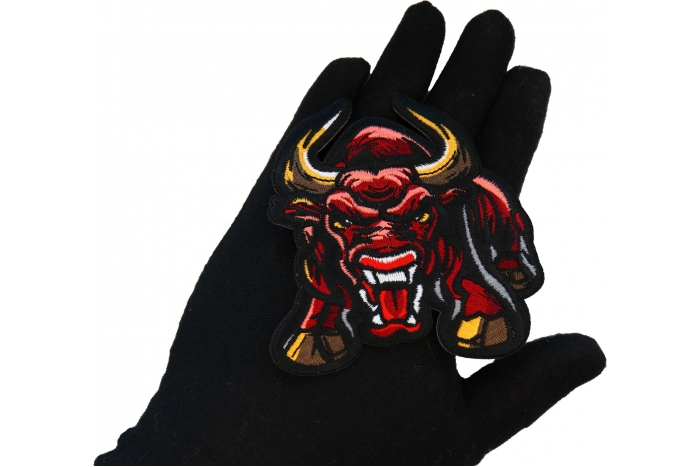 Bull Charging Patch shown on hand for size comparison