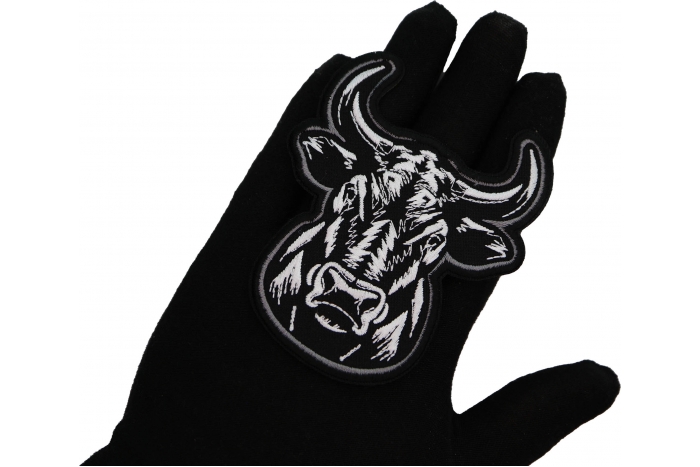 Bull Stare Patch shown on hand for size comparison