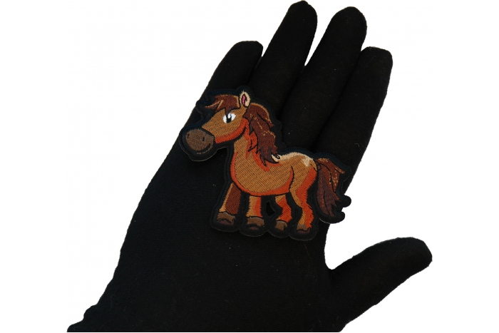 Cartoon Horse Patch shown on hand for size comparison