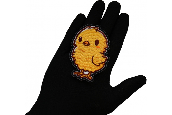 Chick Patch shown on hand for size comparison