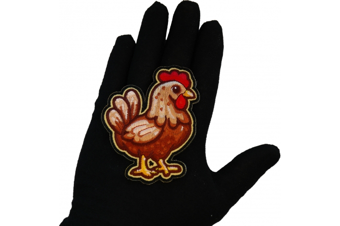 Chicken Patch shown on hand for size comparison