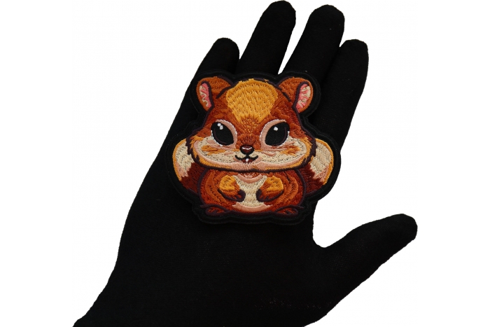 Chipmunk Patch shown on hand for size comparison