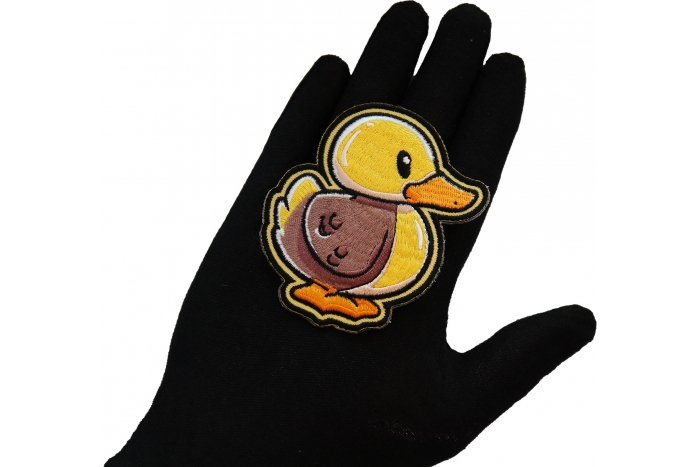 Cute Baby Duck Patch shown on hand for size comparison