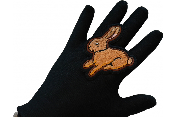 Cute Rabbit Iron on Patch shown on hand for size comparison