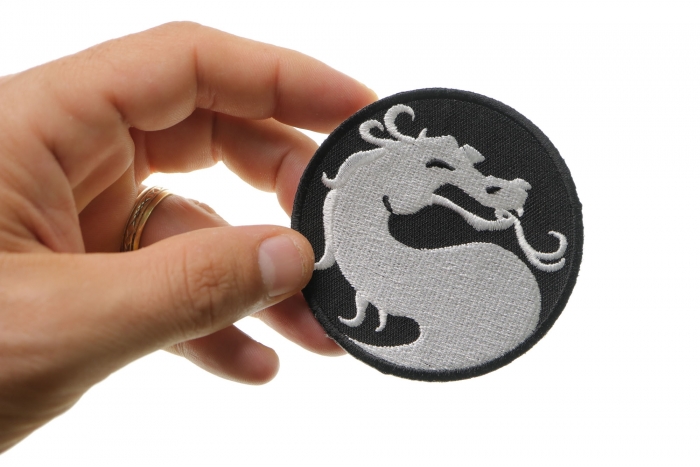 Dragon Patch Small Circular shown on hand for size comparison