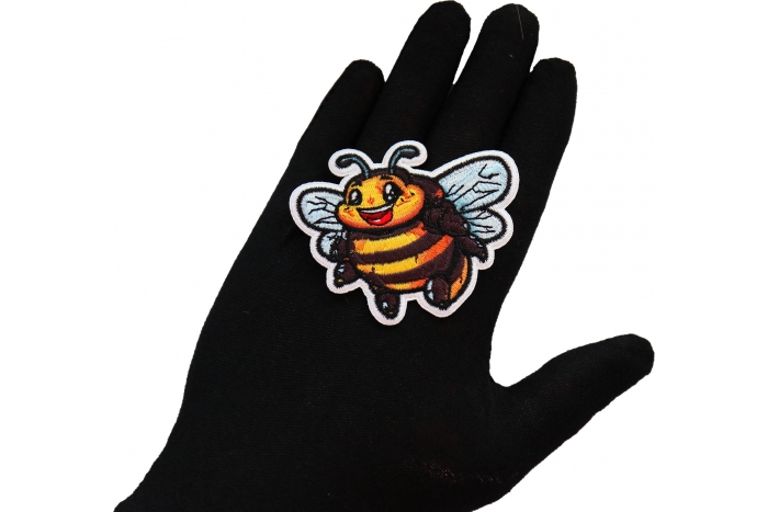 Fat Bumble Bee Patch shown on hand for size comparison