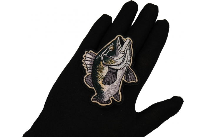 Fish Patch shown on hand for size comparison