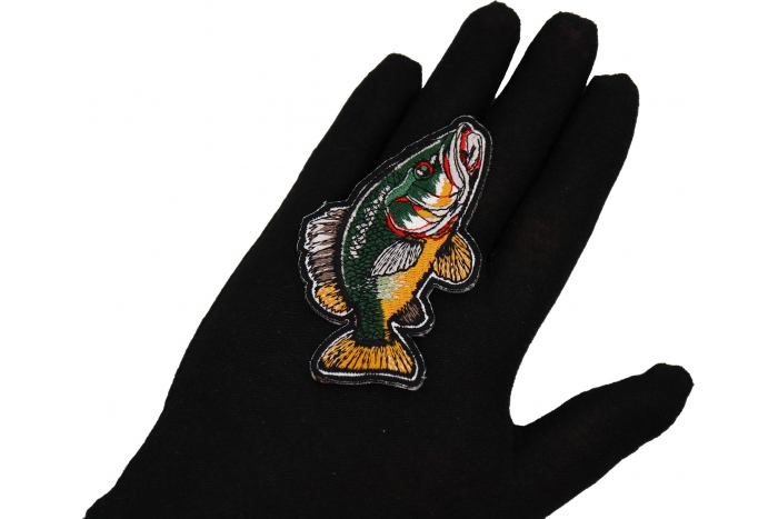 Fish Patch shown on hand for size comparison