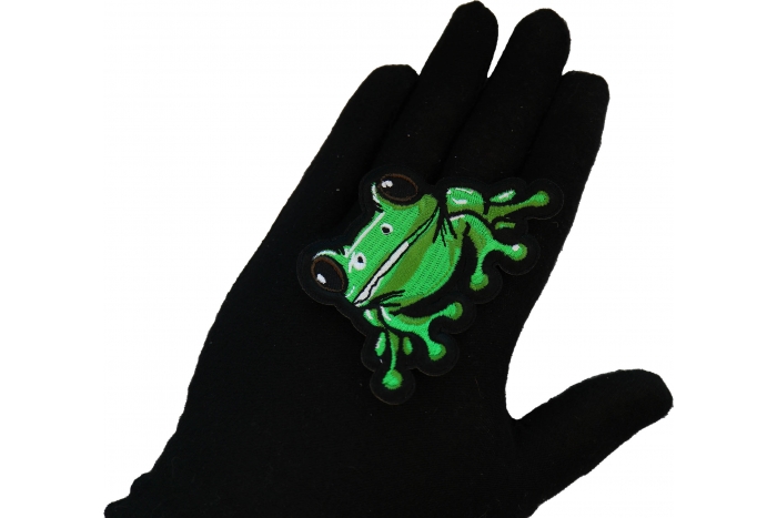Green Frog Patch shown on hand for size comparison