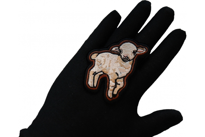 Baby Lamb Iron on Patch shown on hand for size comparison