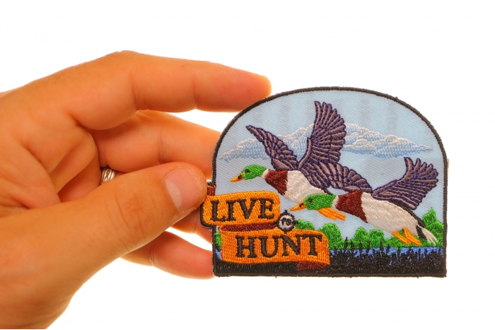  shown on hand for size comparison