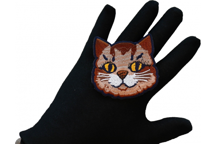 Mister Cat Iron on Patch shown on hand for size comparison