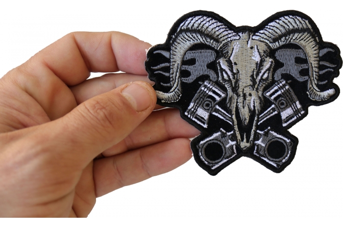 Ram with Pistons Iron on Patch shown on hand for size comparison