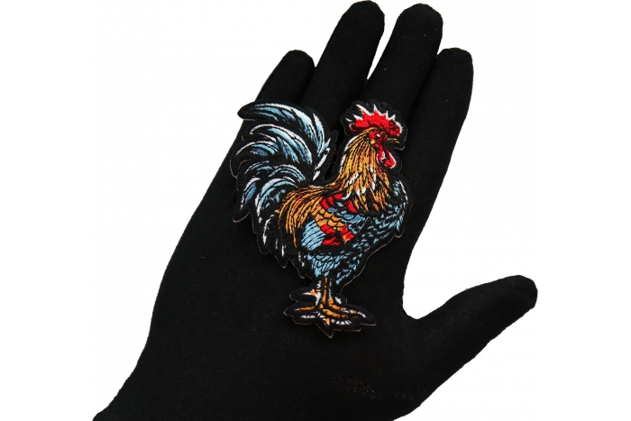 Rooster Cock Patch shown on hand for size comparison