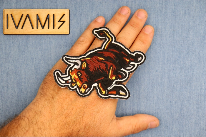 Running Bull Patch shown on hand for size comparison