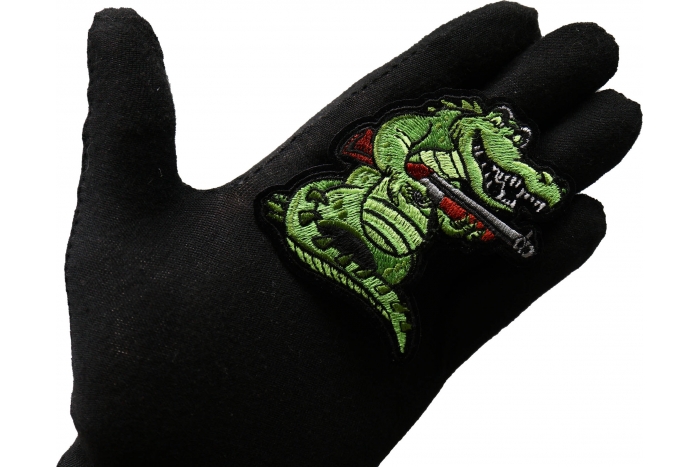 Shotgun Alligator Patch shown on hand for size comparison