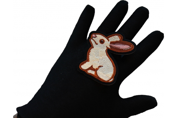 Sweet Rabbit Iron on Patch shown on hand for size comparison