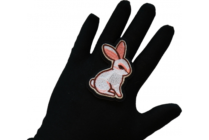 Sweet Rabbit Iron on Patch shown on hand for size comparison