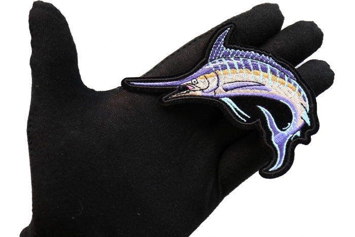 Swordfish Patch for Fishermen shown on hand for size comparison