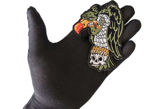 Vulture On Skull Patch shown on hand for size comparison