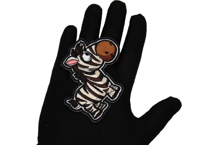 Zebra Patch shown on hand for size comparison