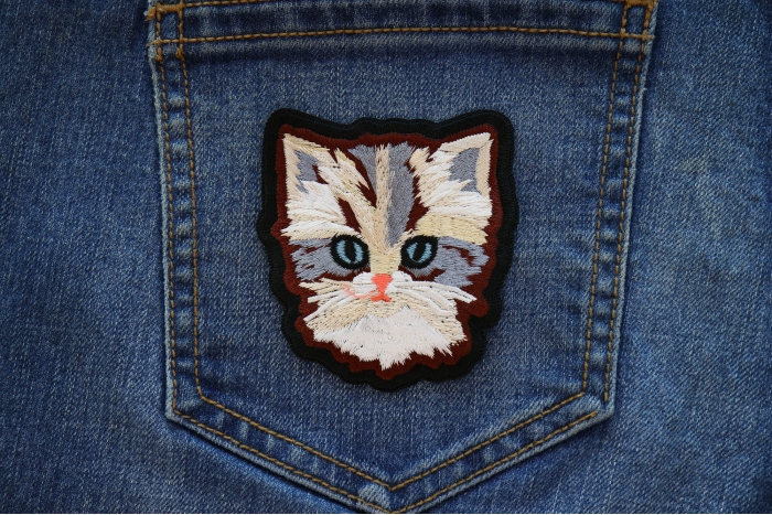 Adorable Cat Iron on Patch shown on jeans