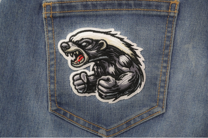 Angry Fighting Badger Patch shown on jeans
