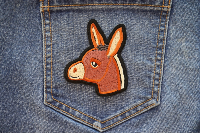 Baby Donkey Iron on Patch shown on jeans