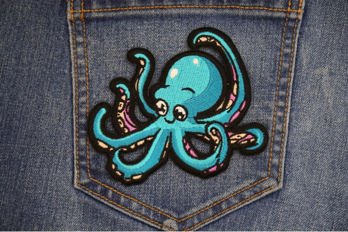 Baby Octopus Patch shown on jeans