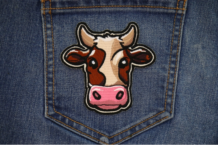 Cartoon Cow Patch shown on jeans