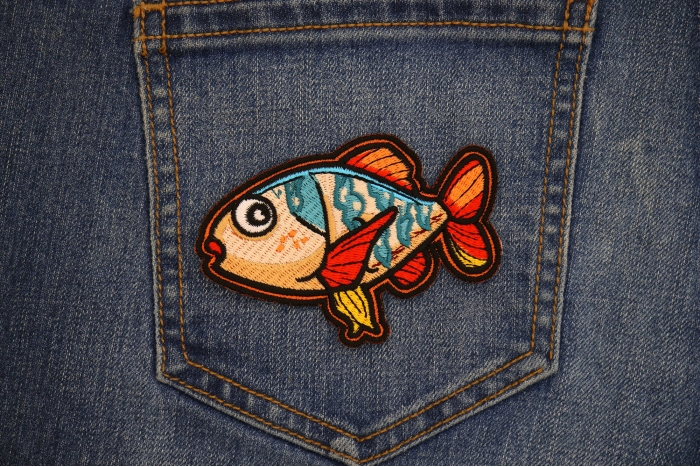 Cartoonish Fish Patch shown on jeans
