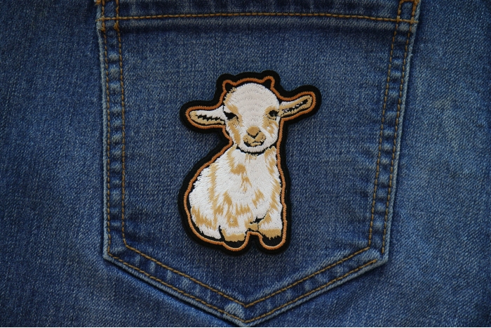Cutey Lamb Iron on Patch shown on jeans