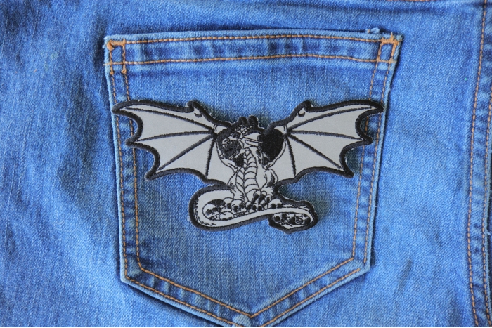 Dragon with Skulls Reflective Patch  shown on jeans