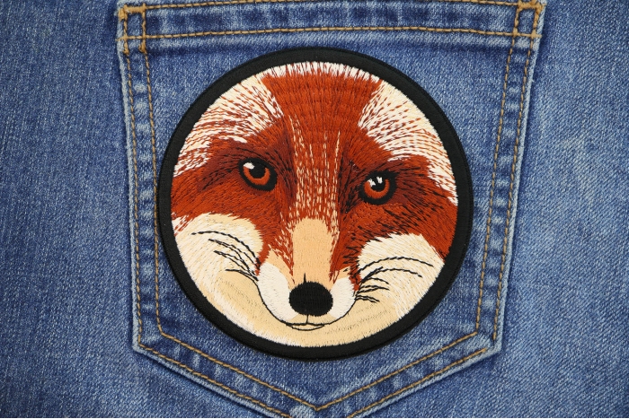 Fox Stare Round Patch shown on jeans