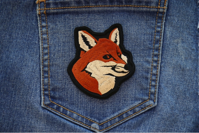 Smiling Fox Patch shown on jeans