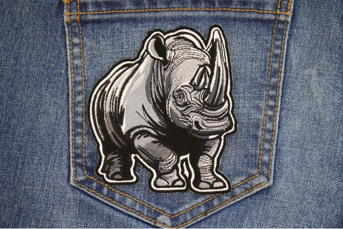 Gray Rhino Patch shown on jeans
