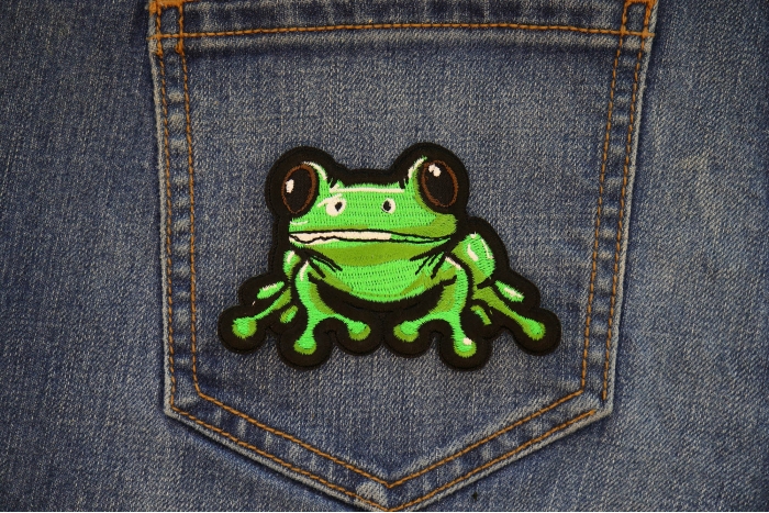 Green Frog Patch shown on jeans