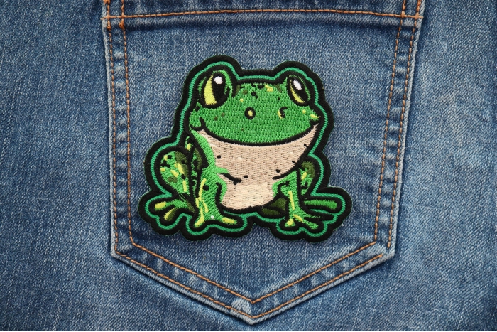 Green Frog Patch shown on jeans