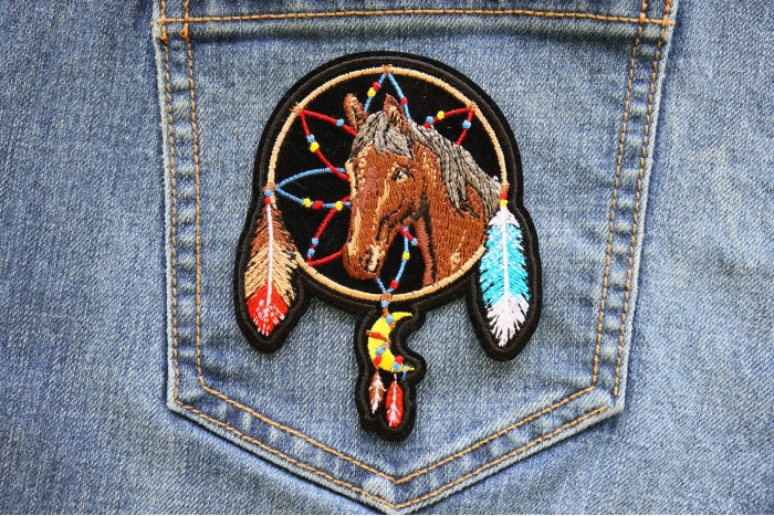 Horse in Dreamcatcher Iron on Patch shown on jeans