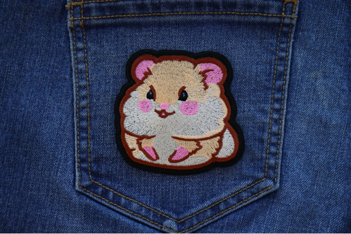 Lady Hamster Iron on Patch shown on jeans